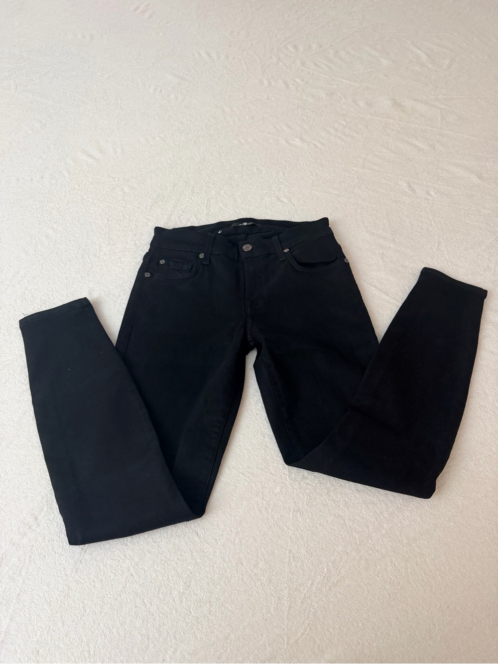 7 For All Mankind black denim jeans with branded interior tag . Skinny